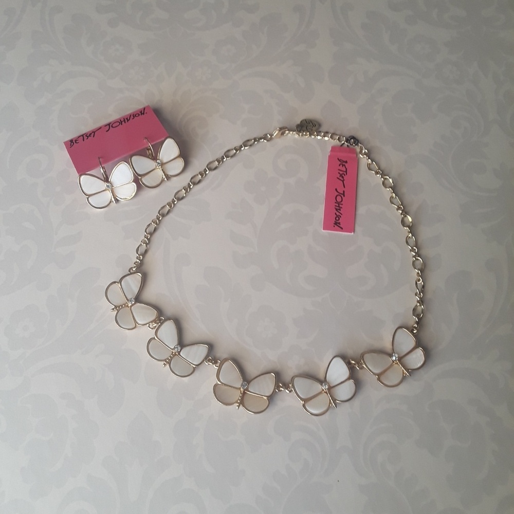 Betsey Johnson pair of earrings and necklaces
